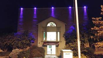 Downlighting a Building Exterior